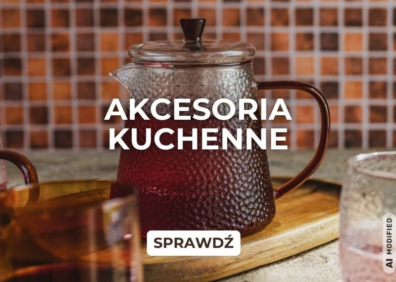 Akcesoria kuchenne &ndash; szklany dzbanek z herbatą na blacie kuchennym
